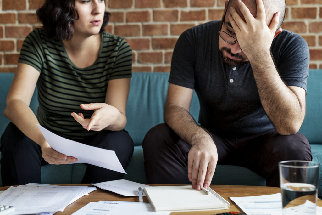 married couple stressed out because of finances